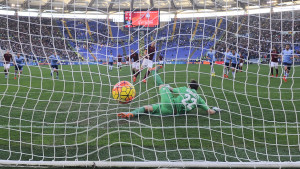 ROME, ITALY - NOVEMBER 08: AS Roma player Edin Dzeko scores a goal from the penality spot during the Serie A match between AS Roma and SS Lazio at Stadio Olimpico on November 8, 2015 in Rome, Italy. (Photo by Luciano Rossi/AS Roma via Getty Images)